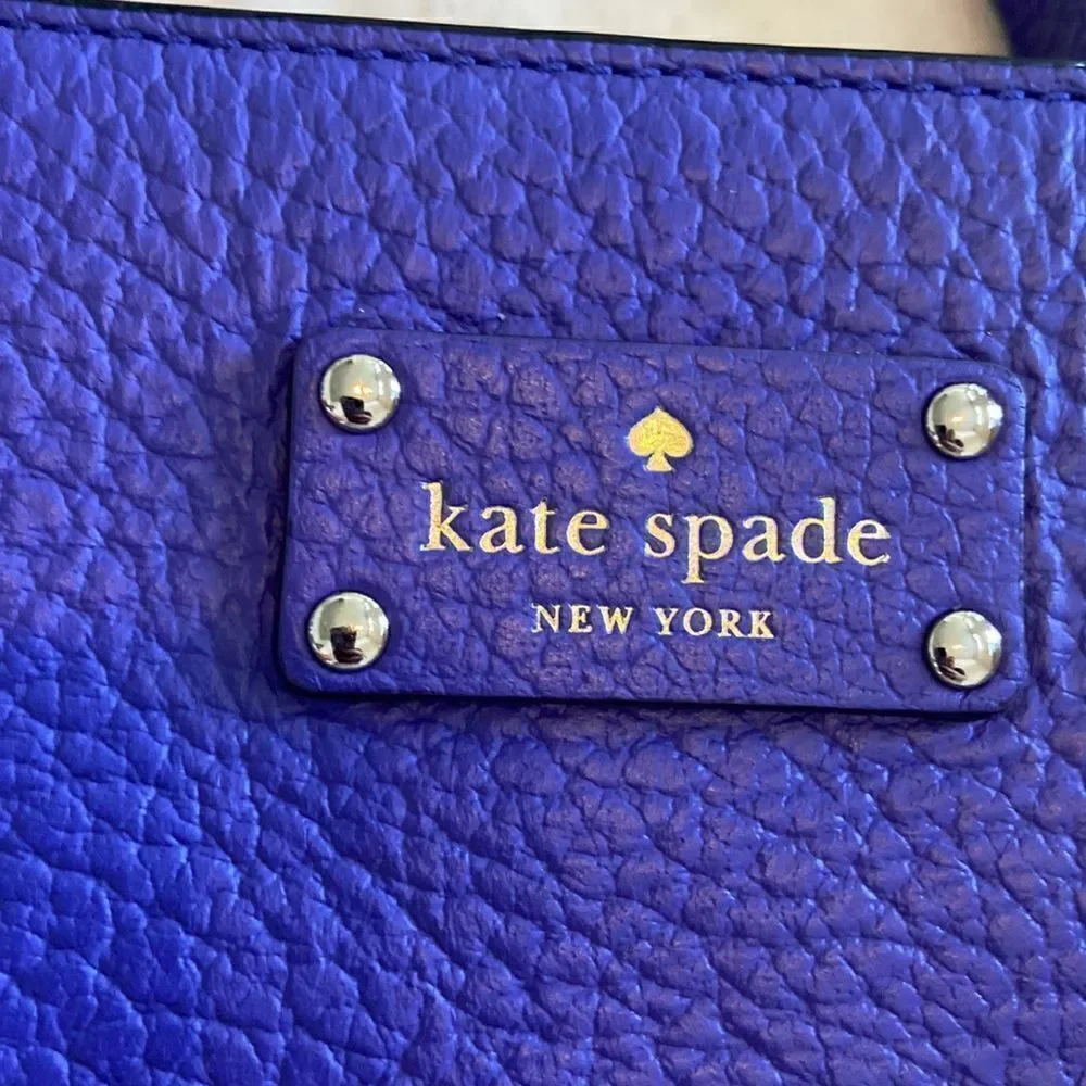 Kate Spade NWOT cross body leather Purple color impeccable